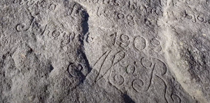 Mikkjal á Ryggi, poem carved in stone